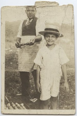 Movses and Nazareth Movsesian make shish kebab, the Bronx, 1924